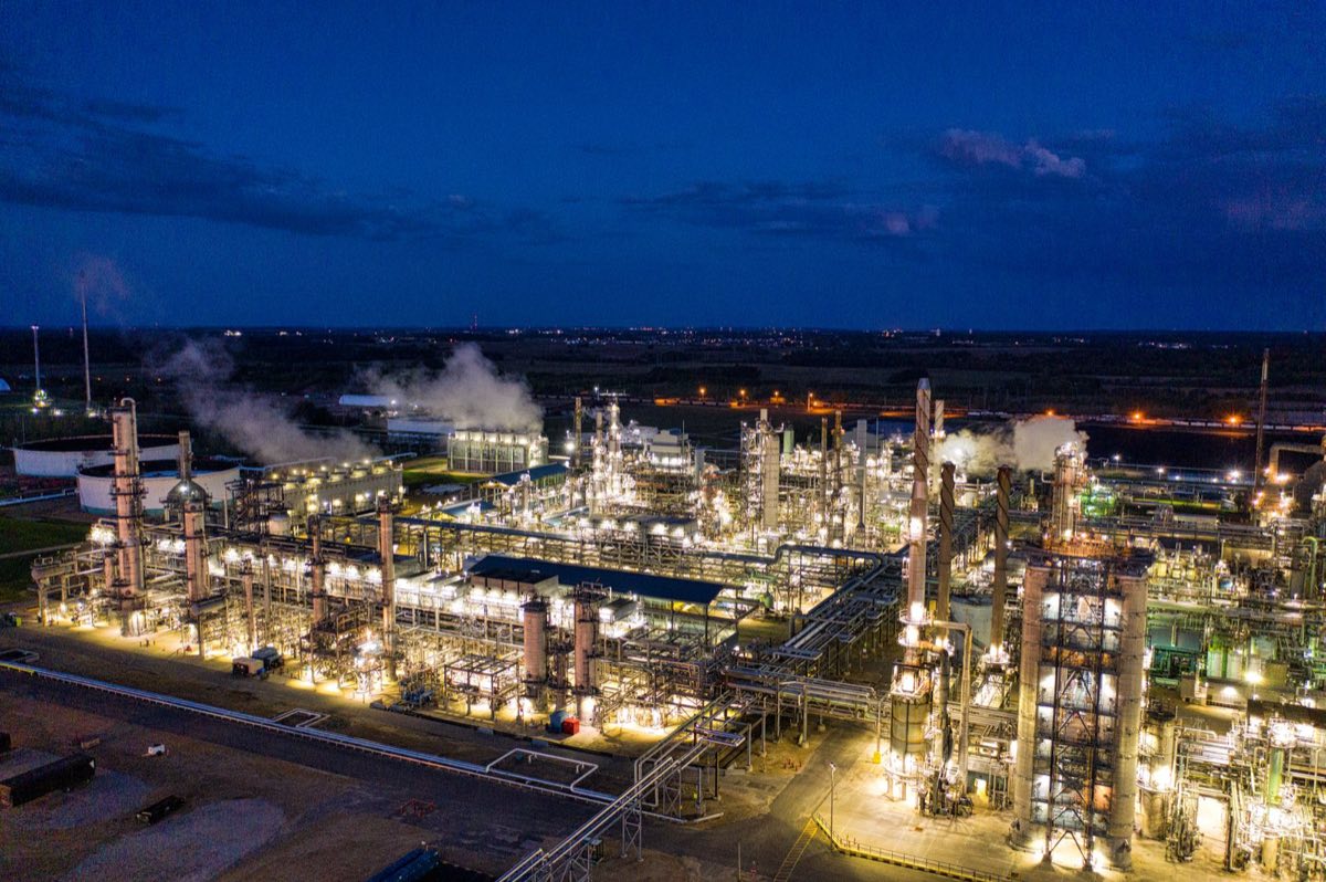 Oil refinery lit up at night